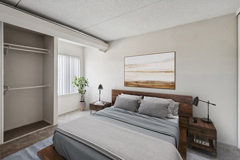 Model Bedroom with Carpet, Closet & Window View at Mason Van Dorn Apartments located in Alexandria, VA.