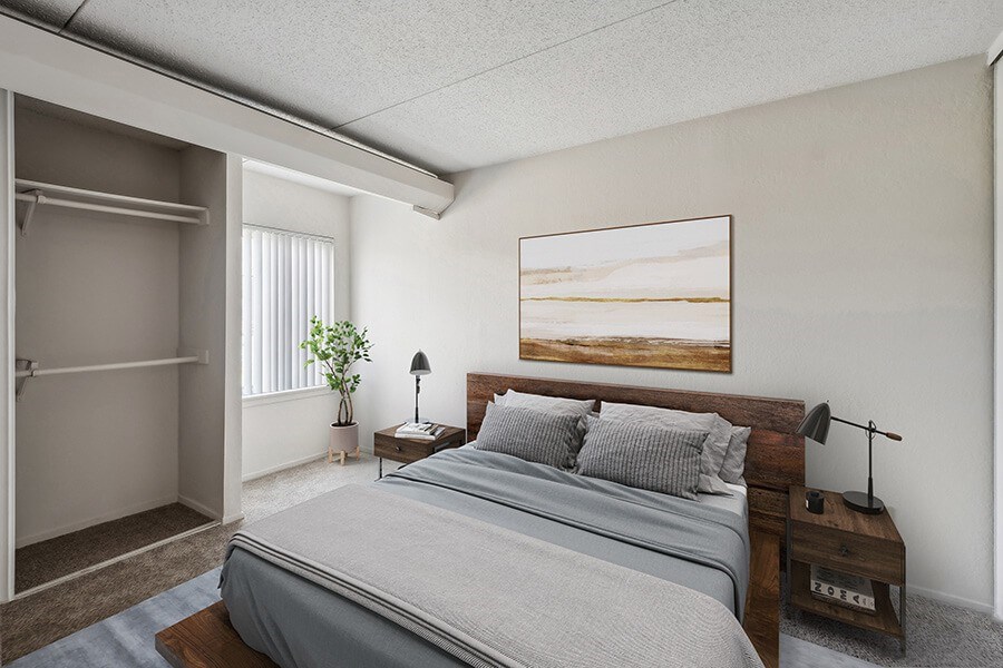 Model Bedroom with Carpet, Closet & Window View at Mason Van Dorn Apartments located in Alexandria, VA.