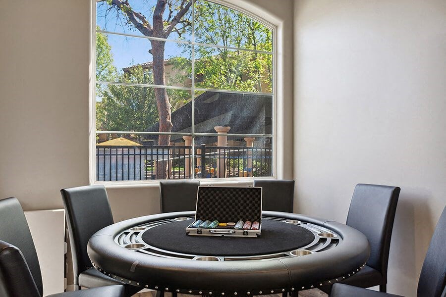 Community Clubhouse Poker Table at Reserve at Rancho Belago Apartments in Moreno Valley, CA.