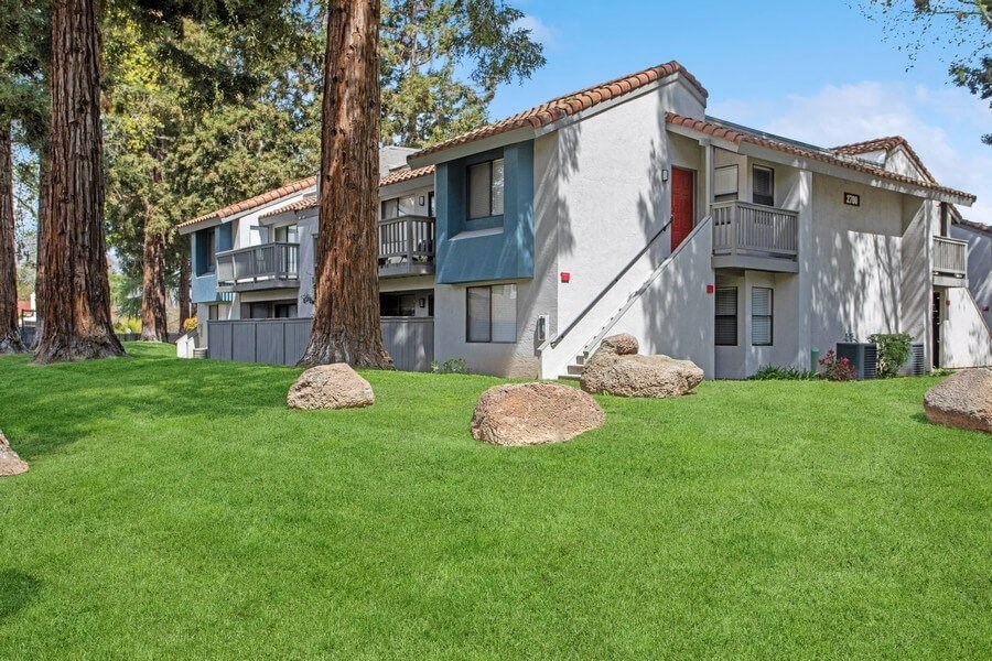 Exterior Community Building and Landscape at Creek 2645 Apartments in Sacramento, CA.