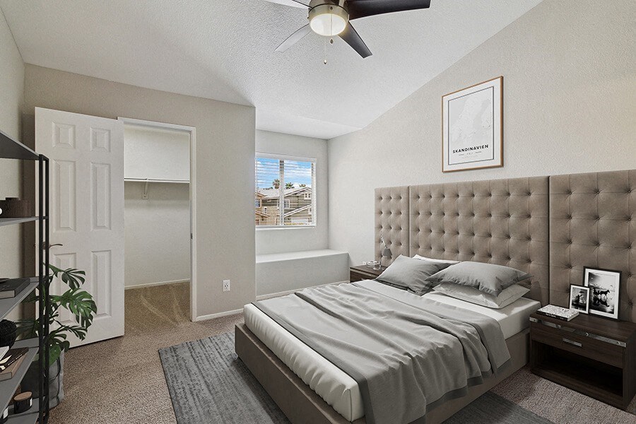 Model Bedroom with Carpet, Walk in Closet & Window Bench at Verraso Apartments in Las Vegas, NV.