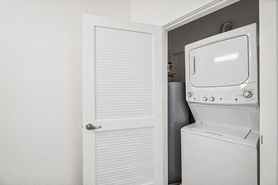 Model Laundry Room with Washer & Dryer at Stella Apartments located in New Carrollton, MD.