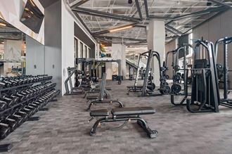 Expansive resident gym with state-of-the-art equipment at Post District Residences in Downtown Salt Lake City, Utah