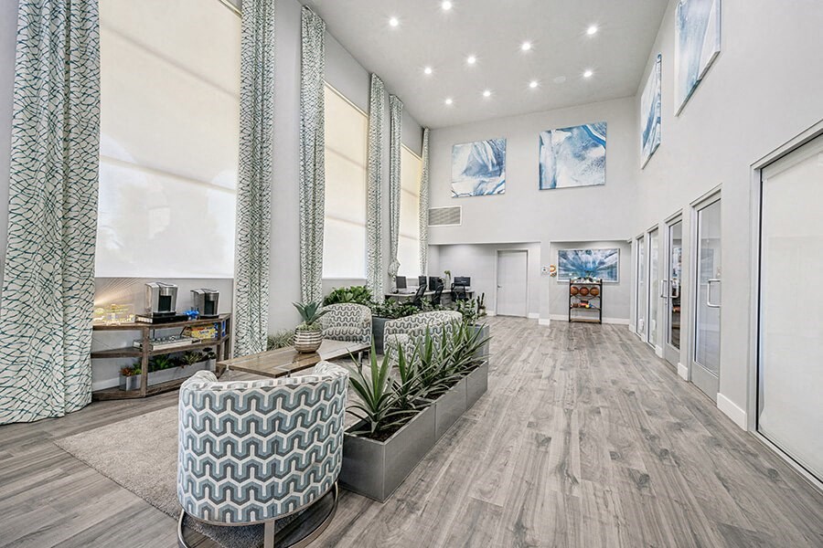 Community Clubhouse with Lounge Furniture at Stillwater Apartments located in Glendale, AZ.