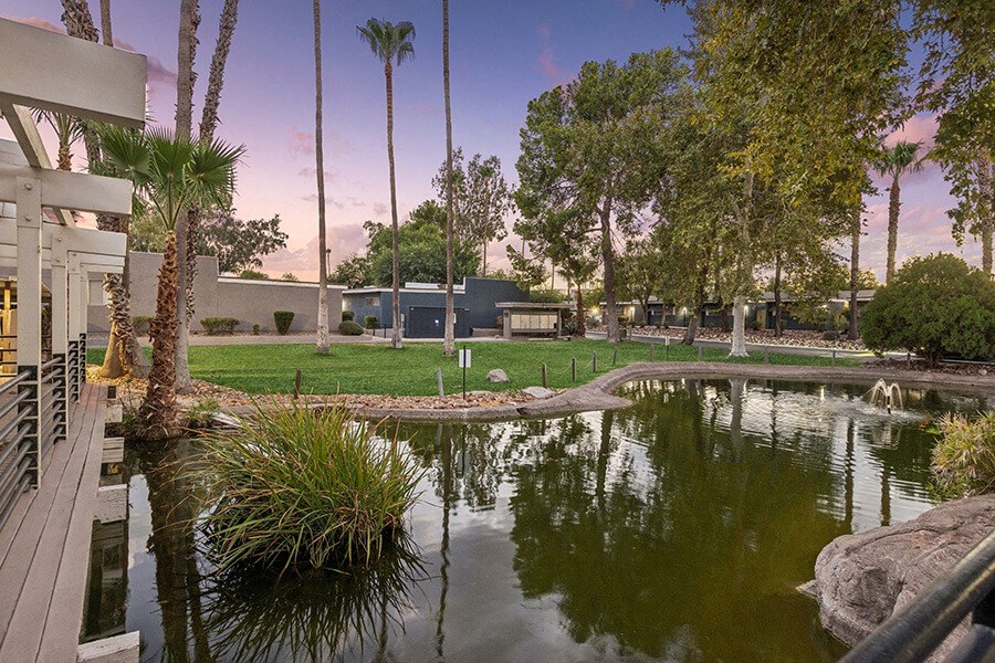 Community Pond and Landscape at Lakeside Casitas Apartments located in Tucson, AZ.