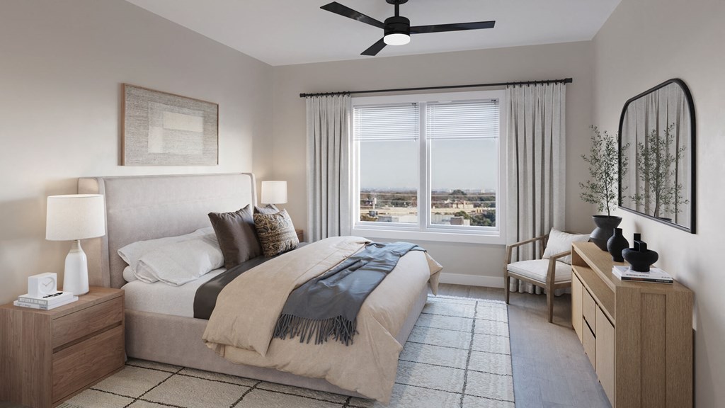 Model bedroom  at The Howard Apartments in Manor, Texas