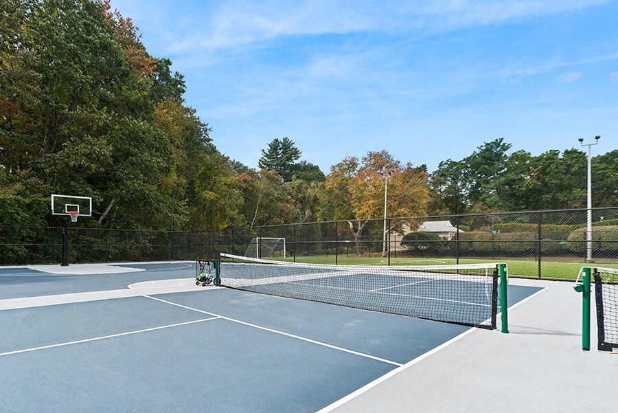 Community Pickleball Courts with Nets at Meadows at Marlborough Apartments located in Marlborough, MA.
