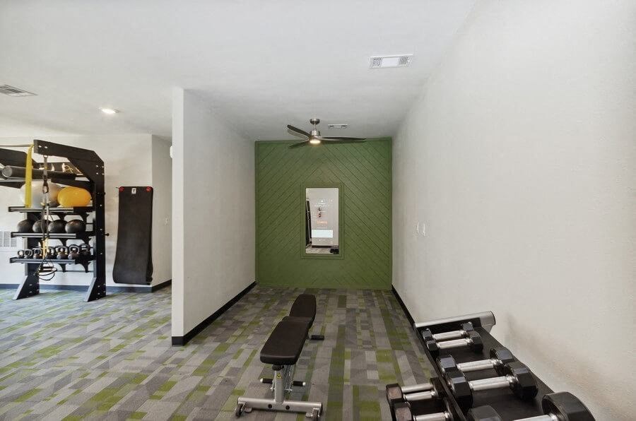 Fitness center free weights at Cobblestone, Arlington, TX