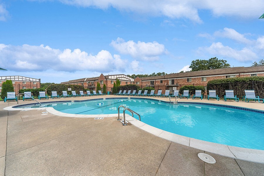 Community Swimming Pool with Pool Furniture at Heights Marlborough Apartments in Boston, MA.