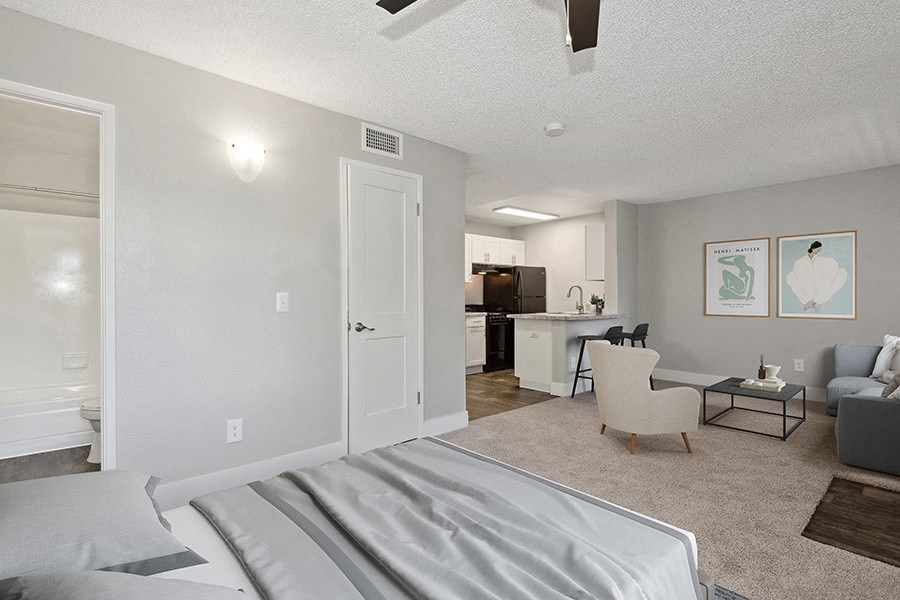 Model Studio Bedroom with Carpet at Stillwater Apartments in Glendale, AZ.