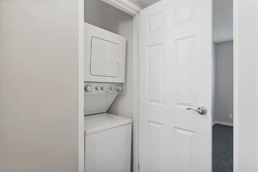 Model Unit Stackable Washer and Dryer Hook Up at Overlook Point Apartments in Salt Lake City, UT.