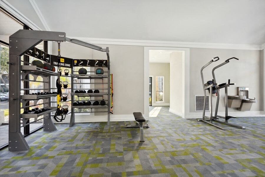 Indoor Fitness Center Weight Area at Caribbean Breeze Apartments in Tampa, FL.