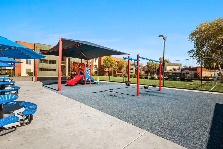 Playground with swings at Saratoga Ridge, Arizona, 85022