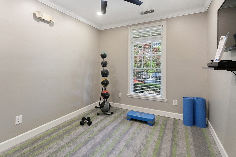 Fitness center yoga area and free weights