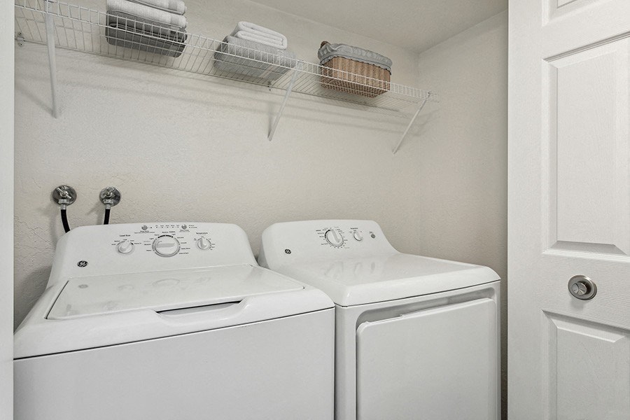 Model Washer and Dryer Hook Up Area at Broadmoor Village Apartments in Salt Lake City, UT.
