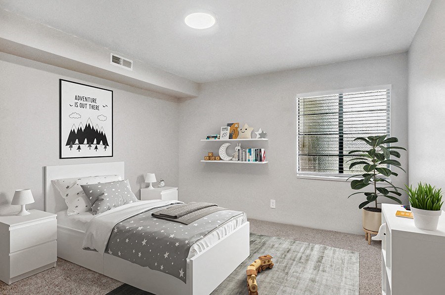 Model Bedroom with Carpet and Window View at Monaco Apartments in Salt Lake City, UT.