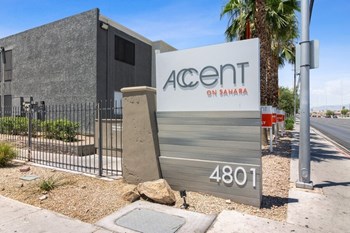 Property entrance sign and landscape