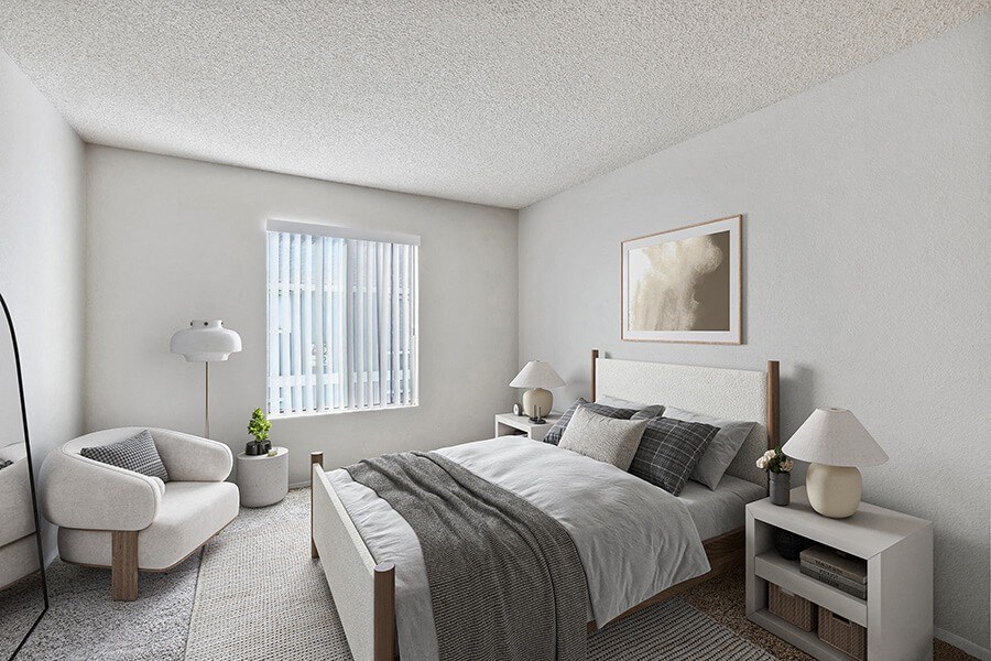 Model Bedroom with Carpet and Window View at Bridges on Sunset Apartments in Suisun City, CA.