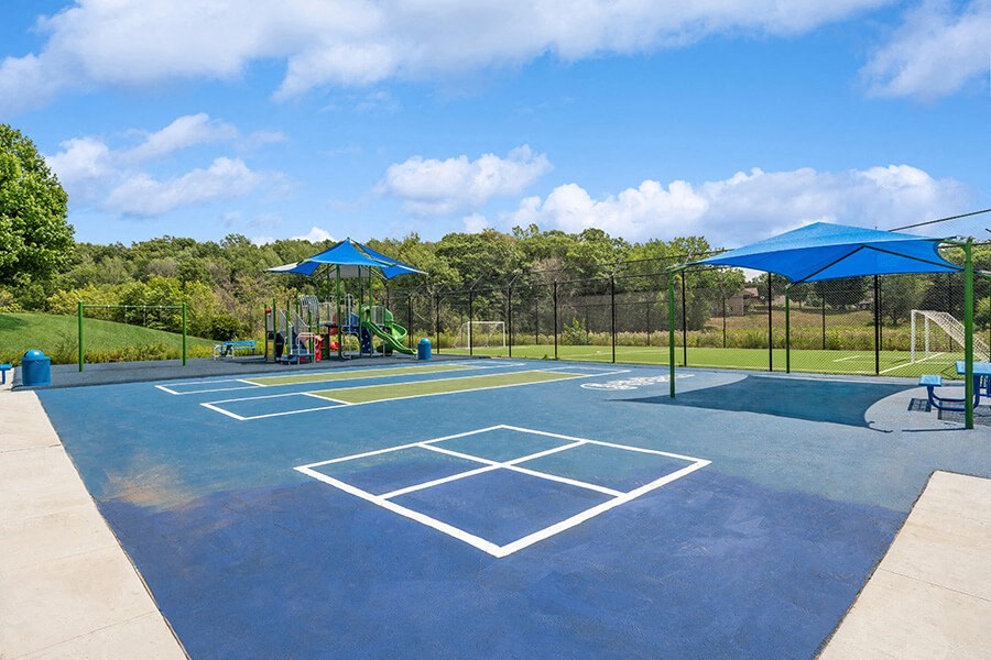 Community Sports Court and Playground Area at Elevate on Parkway Apartments, Minnesota, 55337 