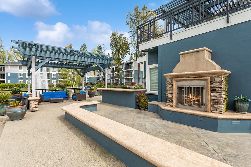 Outdoor Fire Pit Area and Lounge Furniture at Fountains at Point West Apartments in Sacramento, CA.