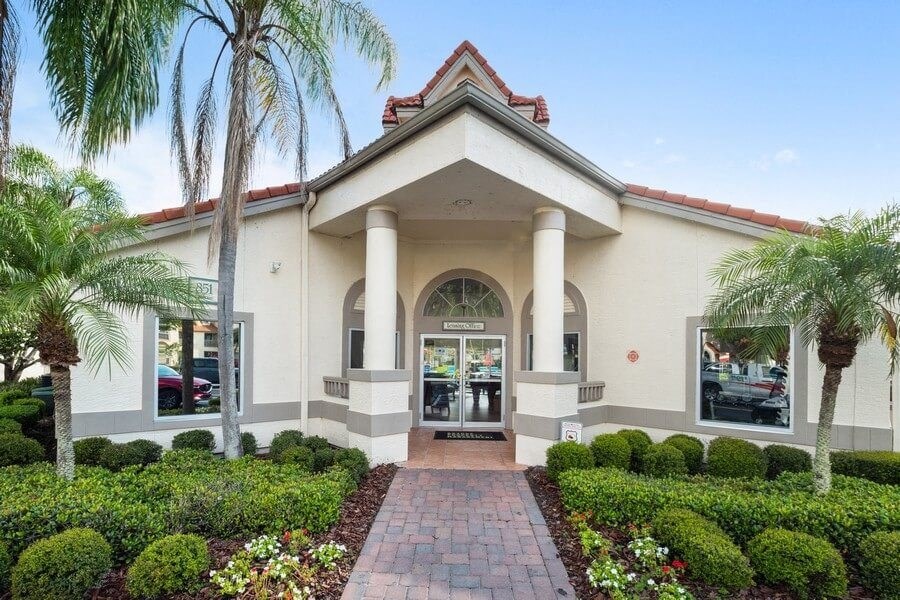 Clubhouse front entrance and well kept landscape