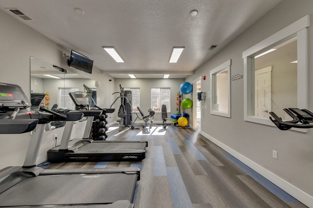 Community Fitness Center with Equipment at Landings at Morrison Apartments located in Gresham, OR.