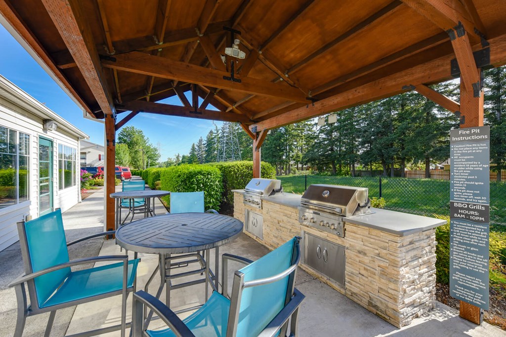 Outdoor BBQ Area with Canopy at Landings at Morrison Apartments located in Gresham, OR.