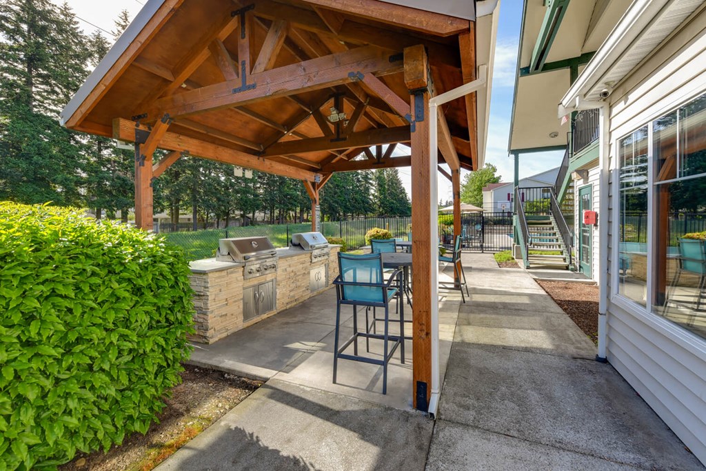 Outdoor BBQ Area with Canopy at Landings at Morrison Apartments located in Gresham, OR.