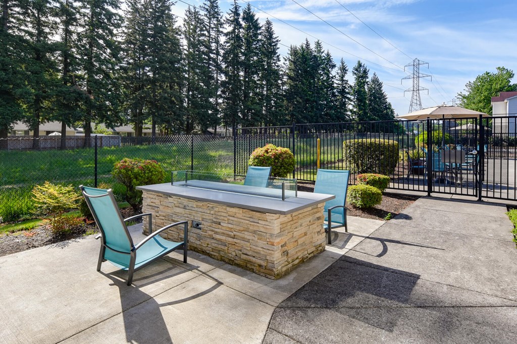 Community Fire Pit Area at Landings at Morrison Apartments located in Gresham, OR.