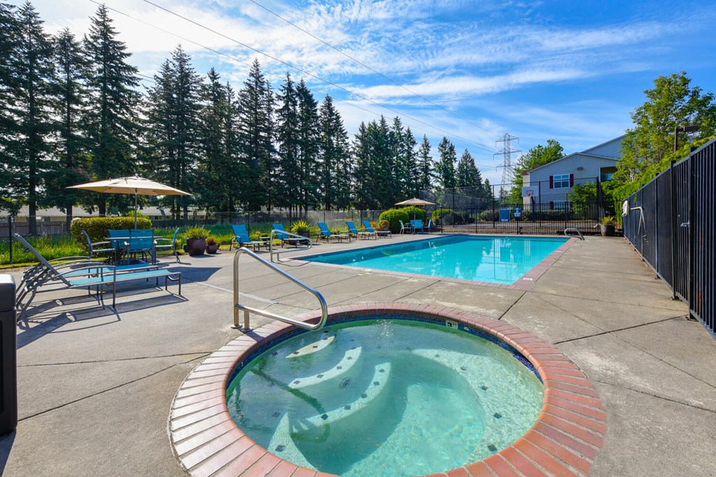 Community Swimming Pool and Hot Tub at Landings at Morrison Apartments located in Gresham, OR.