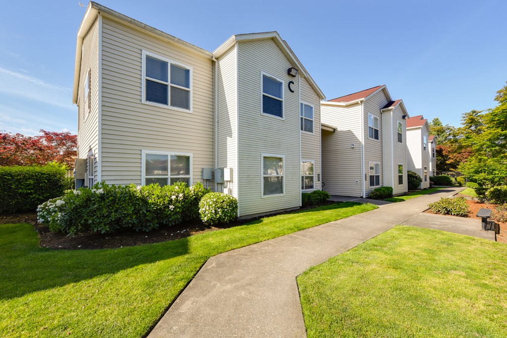 Exterior Community Building and Landscape at Landings at Morrison Apartments located in Gresham, OR.