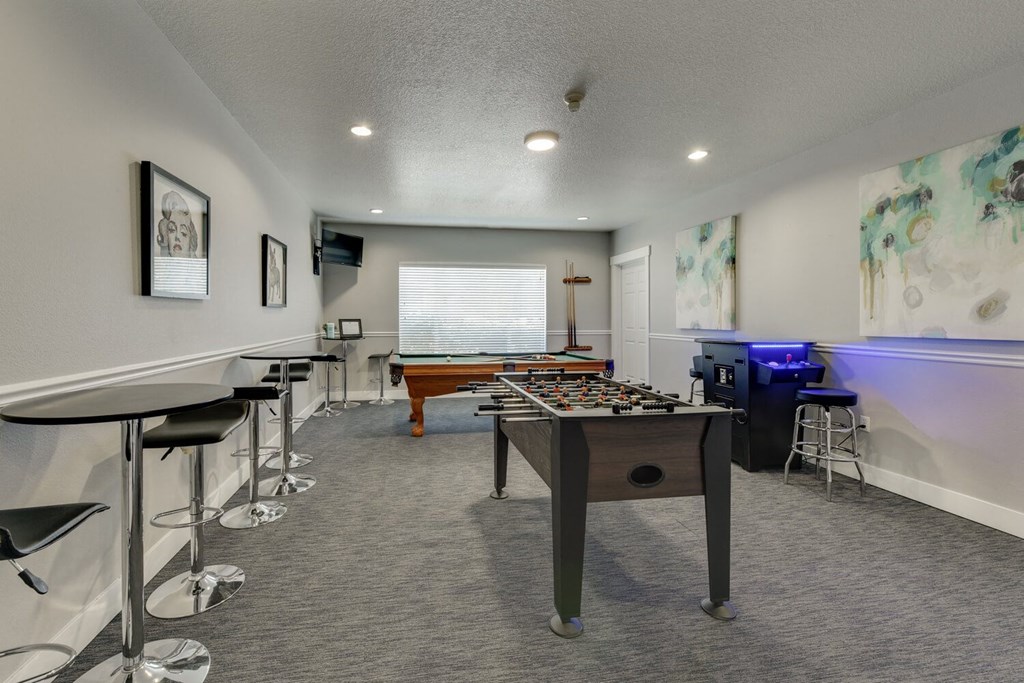 Community Clubhouse with Game Tables at Landings at Morrison Apartments located in Gresham, OR.