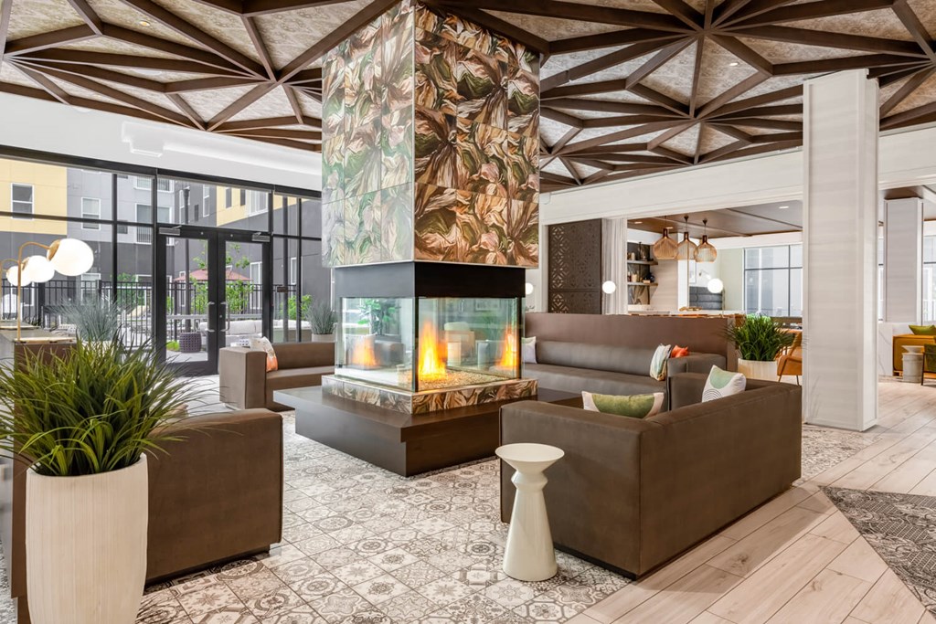 Lobby with couches and a fireplace