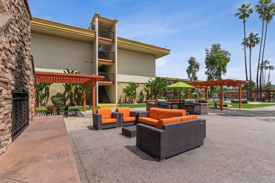 Outdoor lounge area with couches