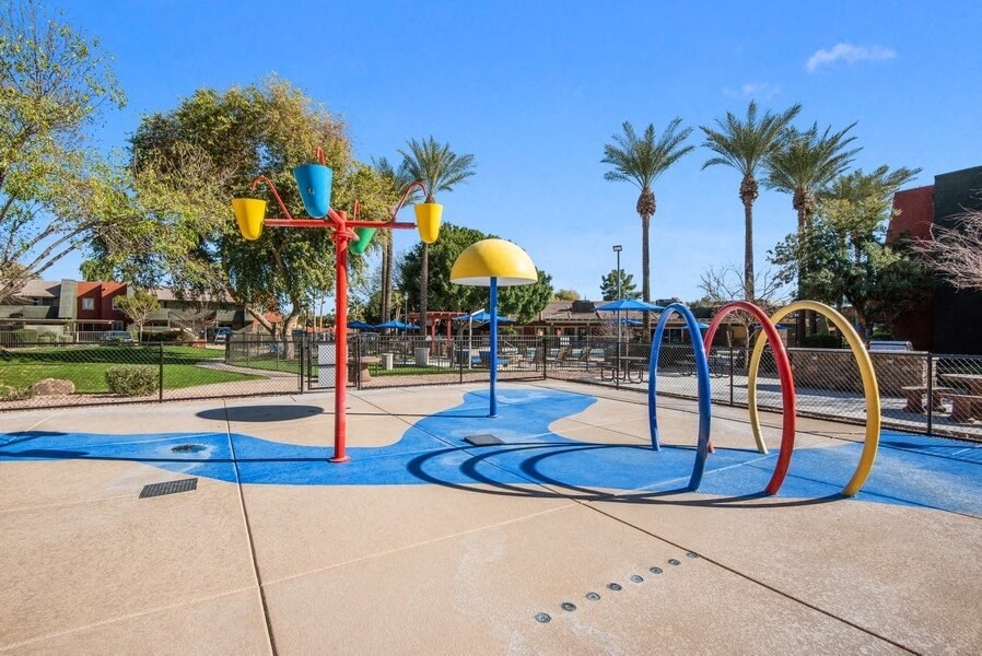 Playground area with basketball hoops at Saratoga Ridge, Phoenix, Arizona