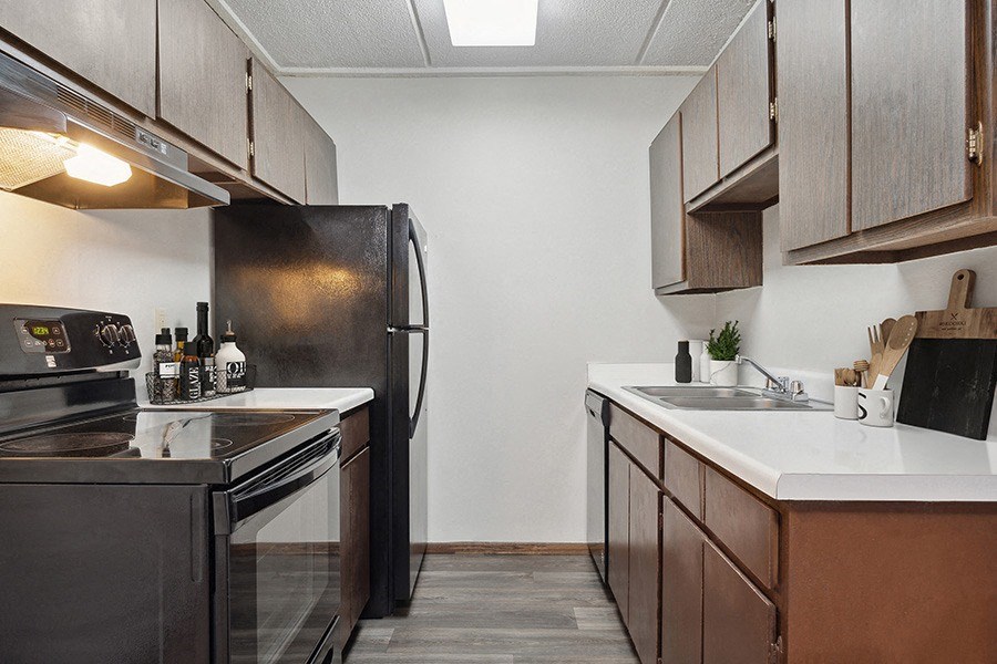 Model Classic Unit Kitchen with Wood-Style Flooring  at Elevate on Parkway, Burnsville