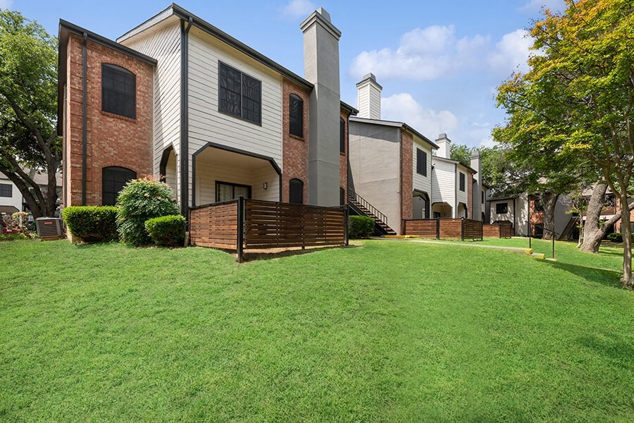Exterior Community Building and Landscape at Dallas North Park Apartments in Dallas, TX.