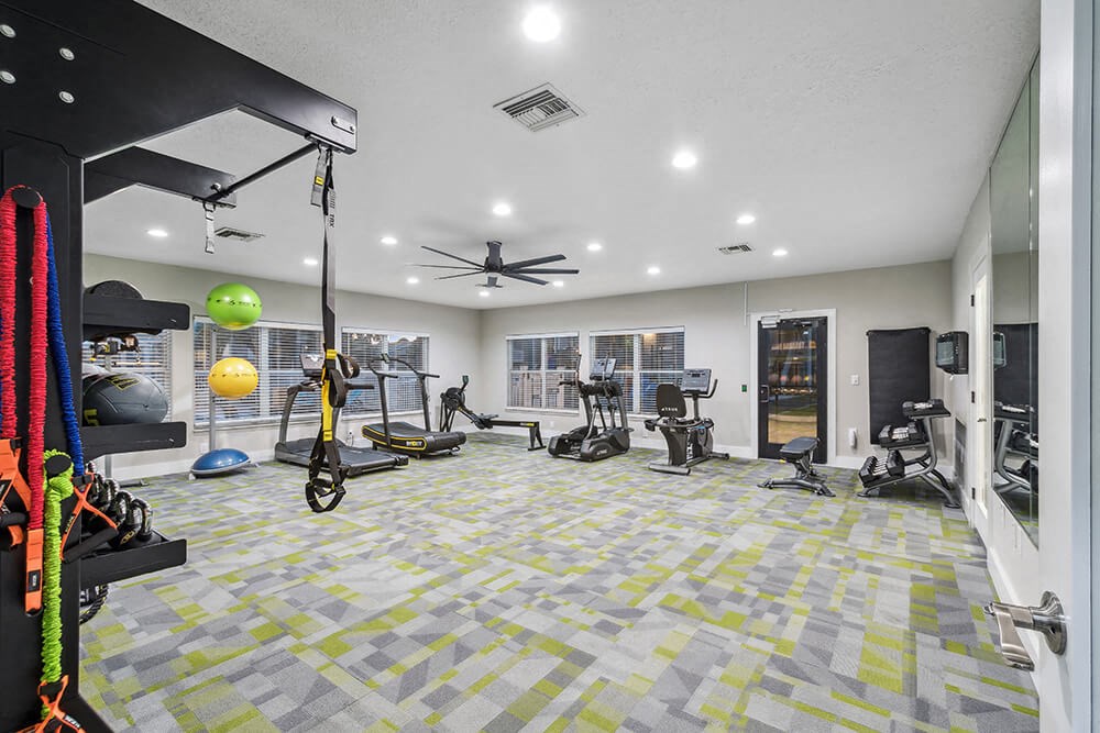 Community Fitness Center with Equipment at Park at 7200 Apartments in Jacksonville, FL.