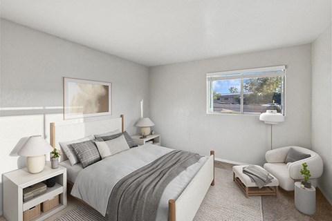Model Bedroom with Carpet and Window View at Tanque Verde Apartments located in Tucson, AZ.