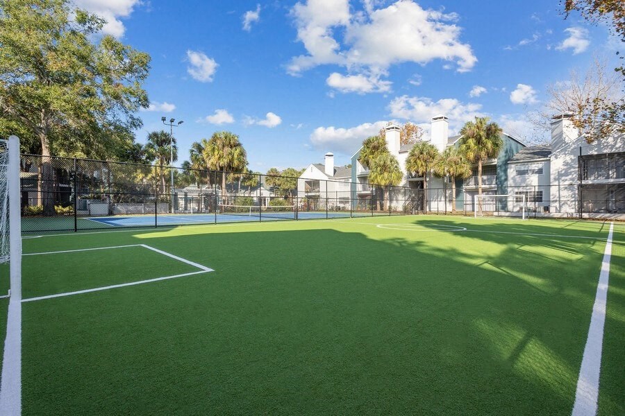 Outdoor Turf Soccer Field at Caribbean Breeze Apartments in Tampa, FL.