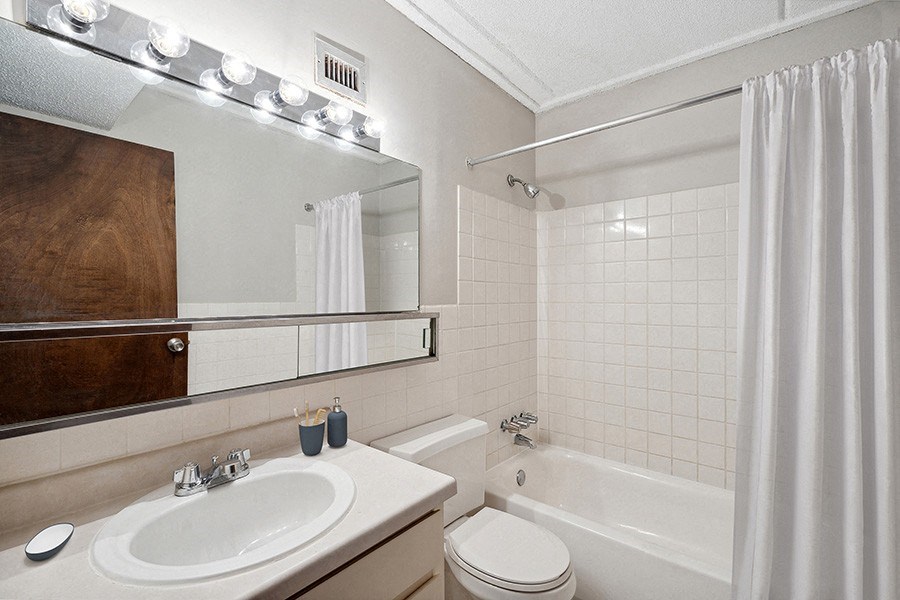 Model Classic Unit Bathroom with Shower/Tub & Wood-Style Flooring at Elevate on Parkway, Burnsville, 55337