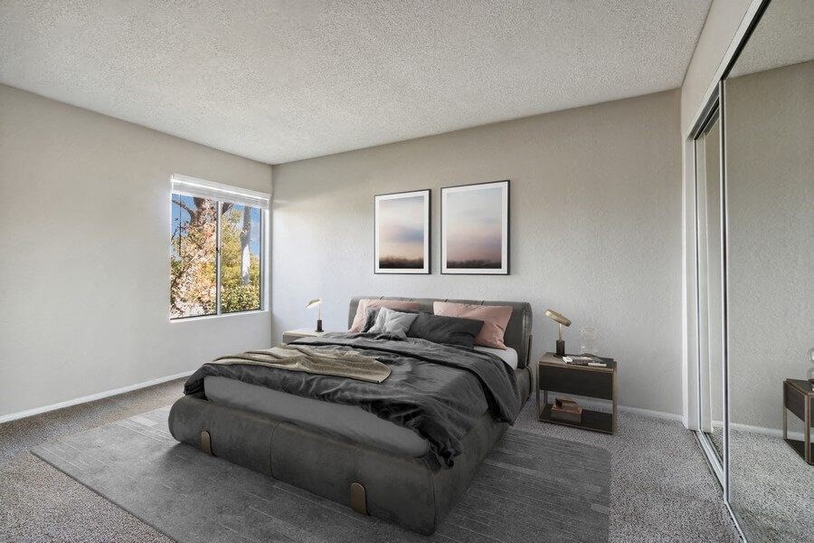 Model Bedroom with Carpet & Window View at Forest Park Apartments in El Cajon, CA.