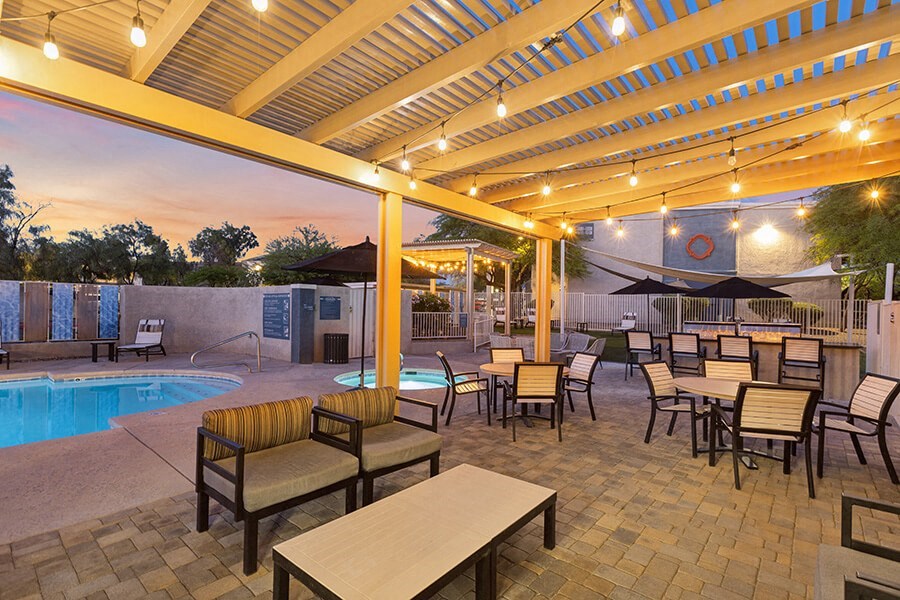 Outdoor Patio Area with Lounge Furniture at Ridgeline Apartments in Tucson, AZ.