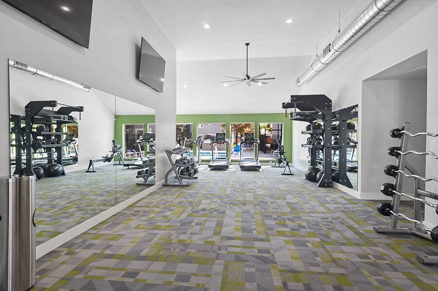 Community Fitness Center with Equipment at Overlook Point Apartments in Salt Lake City, UT.