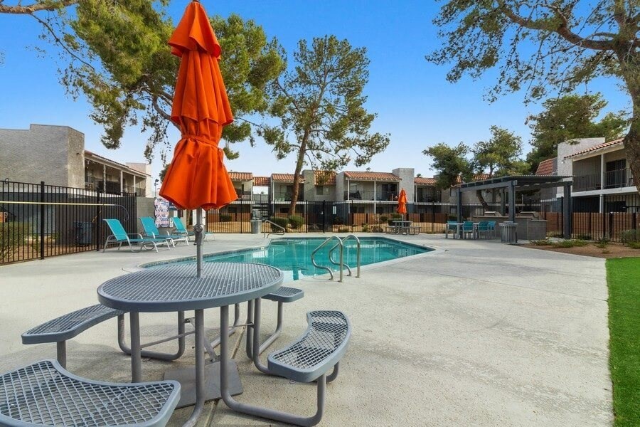 Poolside cabana and lounge chairs