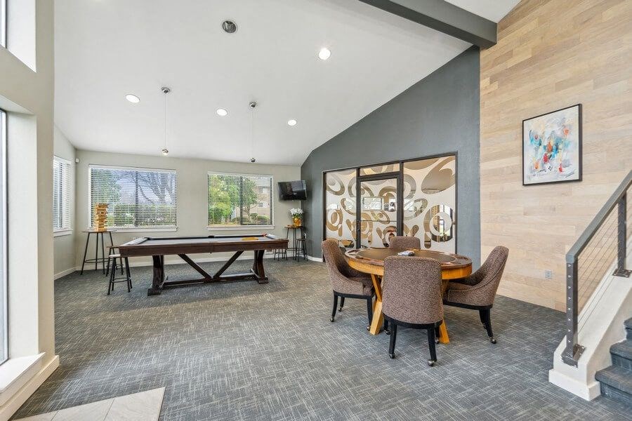 Community lounge area with billiards table
