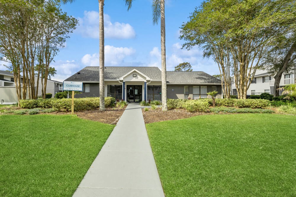 Leasing office exterior with walking path