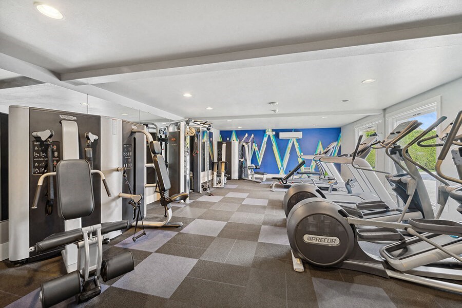 Community Fitness Center with Equipment at Central Flats Apartments in Kent, WA.