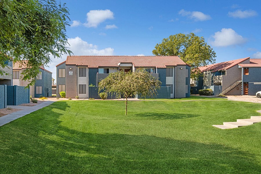 Exterior Community Building and Landscape at Peaks on 4th Apartments in Avondale, AZ.