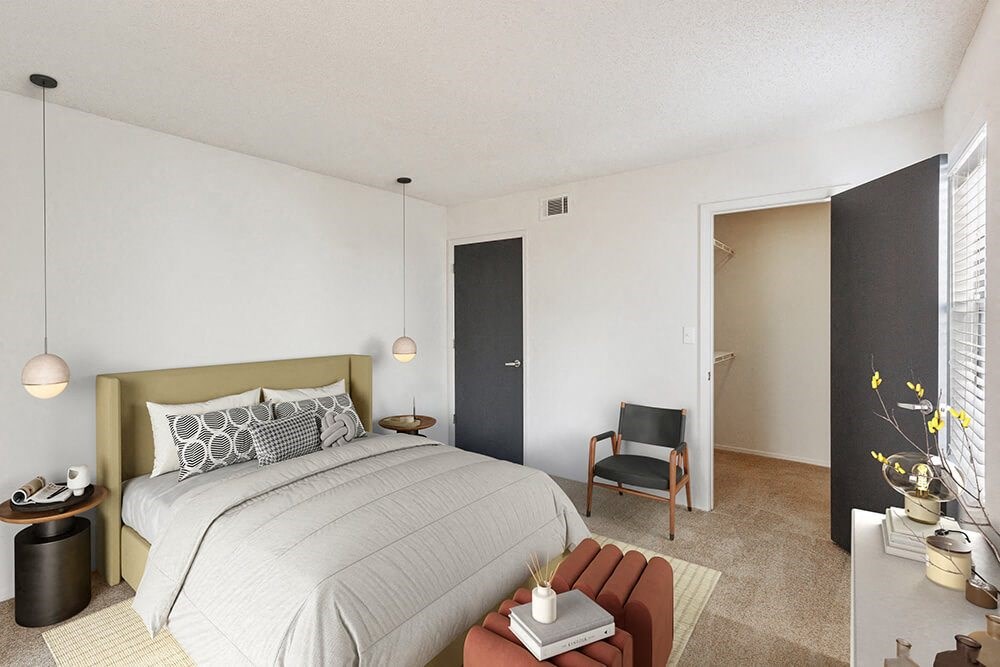 Model Bedroom with Carpet and Walk In Closet at Grandstand Apartments in Marietta, GA.